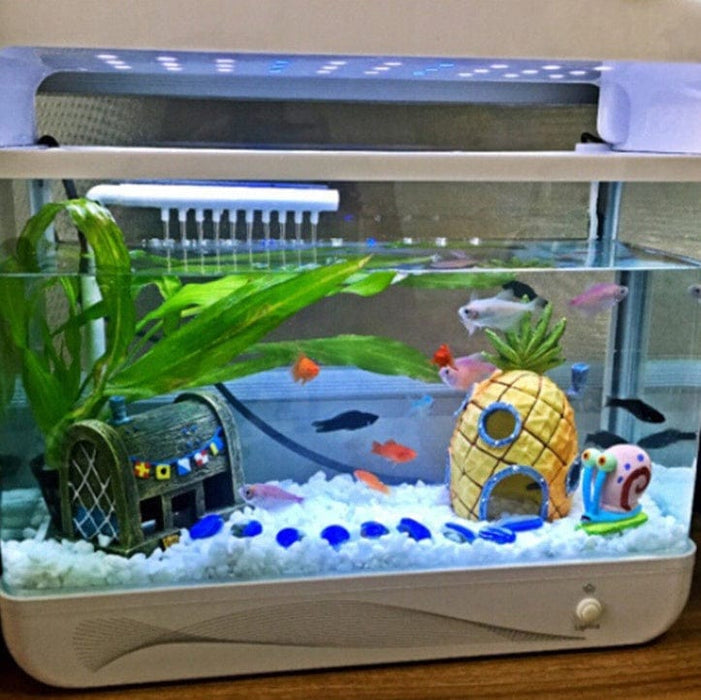 Casa de piña para pecera de acuario