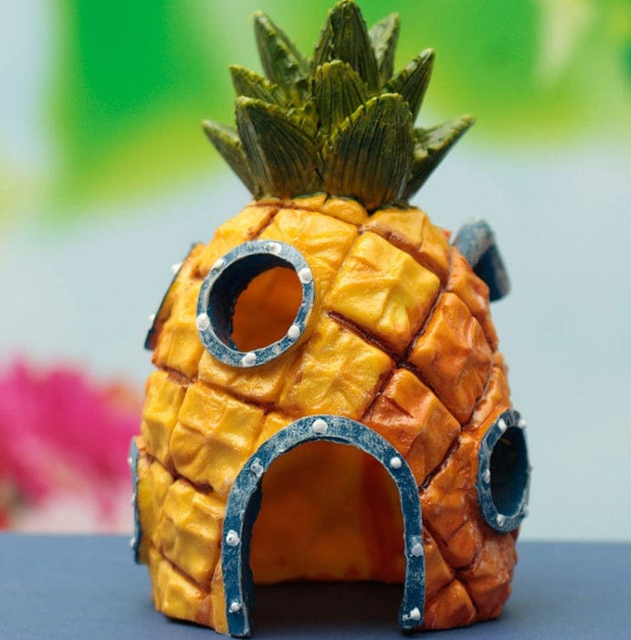 Casa de piña para pecera de acuario
